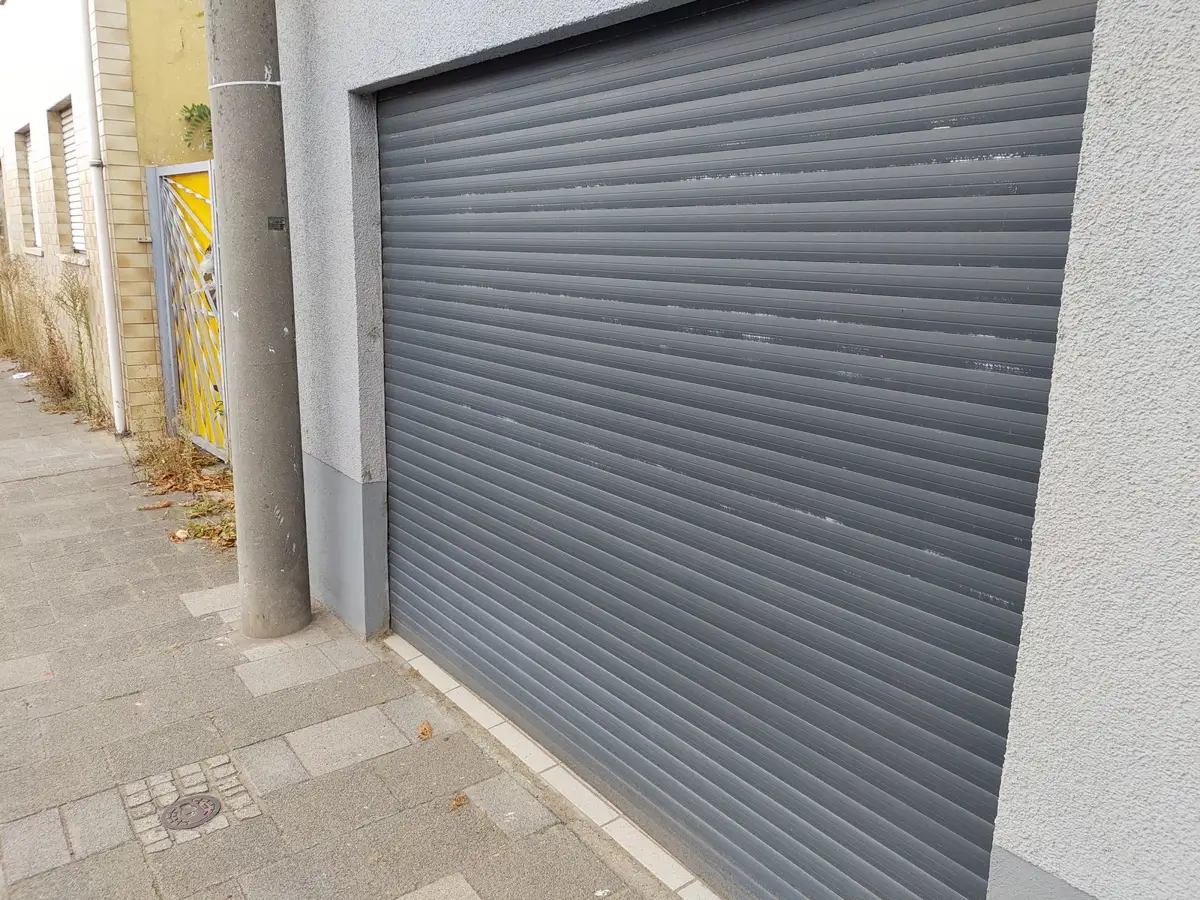 A commercial roller garage door on a building
